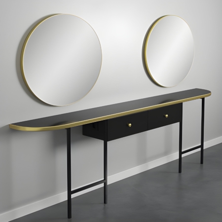 Moderner Konsolentisch mit zwei runden Wandspiegeln, schwarzes Holz mit goldenen Akzenten, vor grauer Wand.