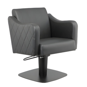 Moderner Friseurstuhl mit schwarzem Lederbezug und diamantförmigem Muster, ideal für Salons und stilvolle Einrichtungen.