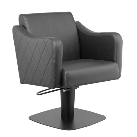 Moderner Friseurstuhl mit schwarzem Lederbezug und diamantförmigem Muster, ideal für Salons und stilvolle Einrichtungen.